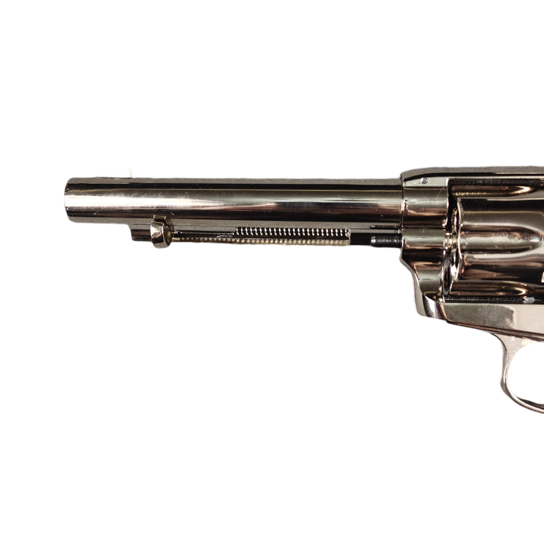 Right-side view of the polished barrel and ejector rod assembly on a classic western revolver
