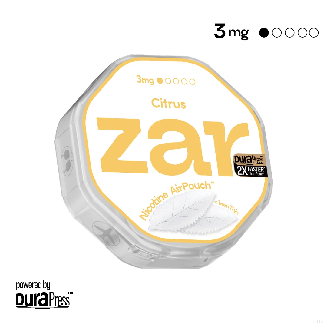 Zar Pouch Citrus 9mg nicotine pouch tin with fresh lemon and orange slices in outdoor daytime setting