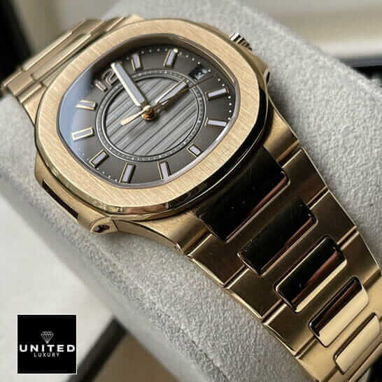 Patek Philippe 7011-1R-010 Gold Bracelet Replica on the stand