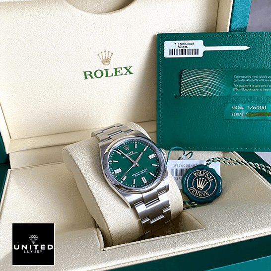 Rolex Oyster Perpetual 126000 Green Dial Replica & Guarantee Card in the Rolex Box