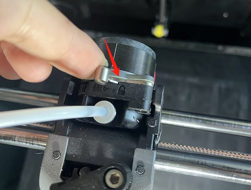 unlock the extruder lever