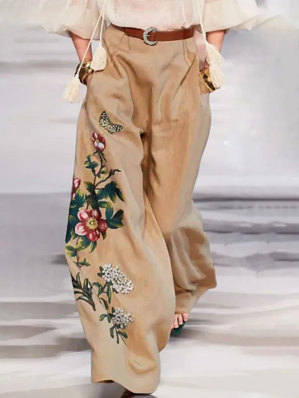 100% linen high-waisted trousers with floral hand-embroidery
