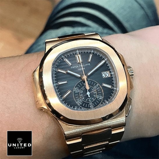 Patek Philippe Black Dial Rose Gold Bezel Replica in the man wrist