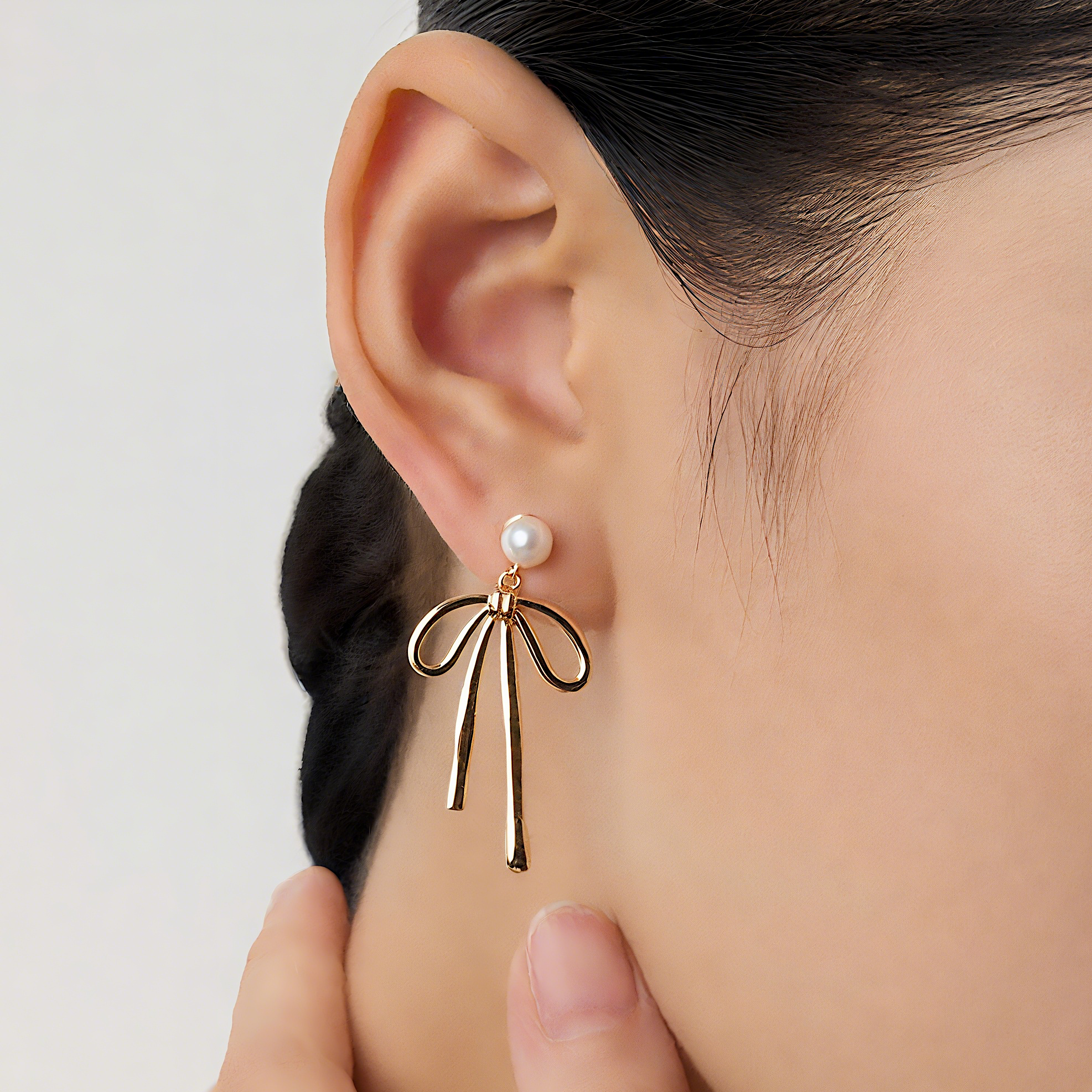 Linear Bow Pearl Gold Plated Drop Earrings