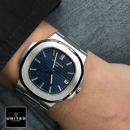 Patek Philippe Nautilus Platinum Blue Dial Replica on the man wrist