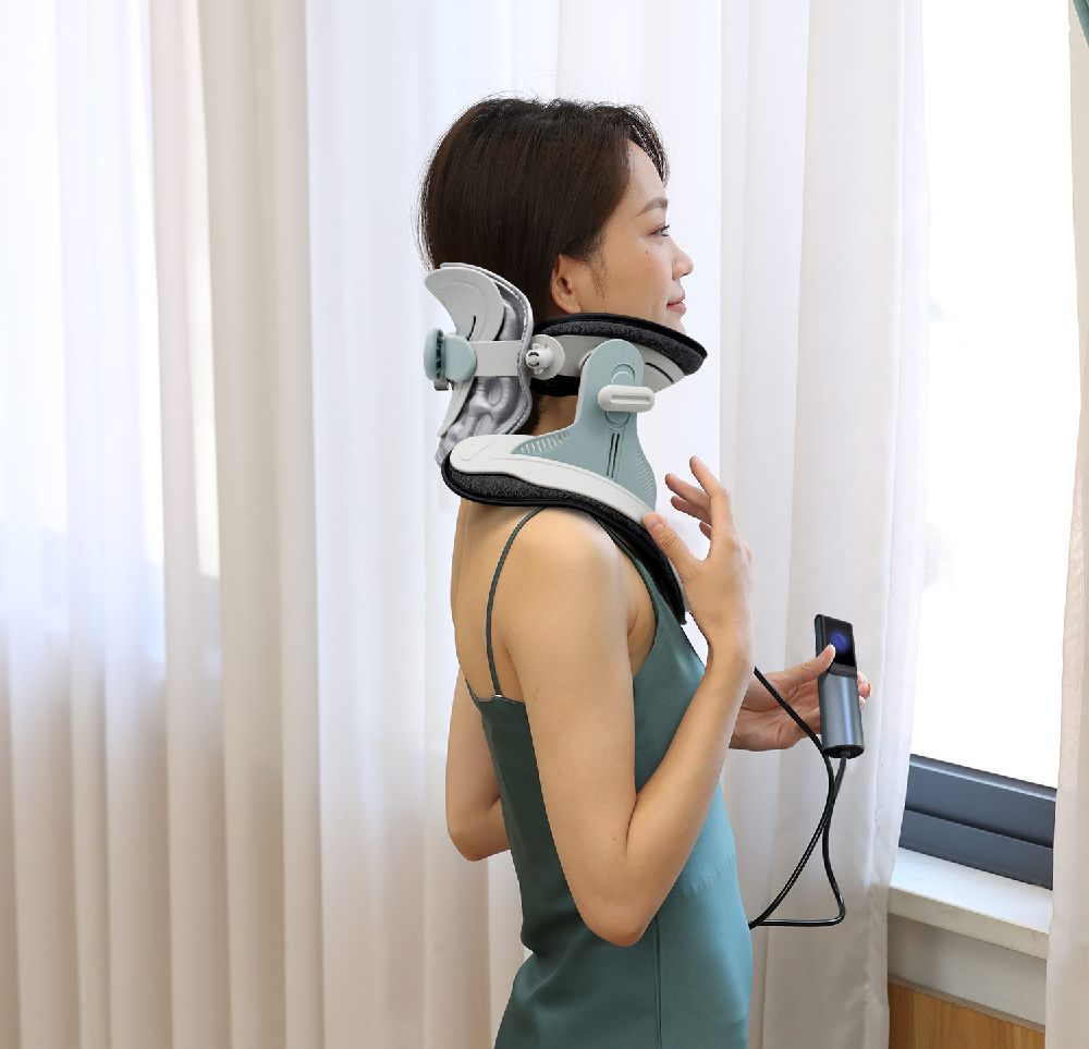 A modern cervical traction device designed to provide neck pain relief. The Cervitrax Gen-2 features an ergonomic design with adjustable straps, comfortable padding, and an easy-to-use inflation pump. The device is shown in use, supporting the user's neck and gently stretching the cervical spine for therapeutic benefits.
