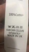 可能是包含下列内容的图片:上面的文字是“100%Cotto 1X0 WASH DARK COLOURS SEPARATELY MADE IN UK”