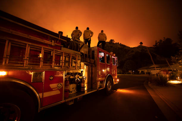 California Wildfire Monrovia, California / USA - September 15, 2020: Firefighters work the Bobcat Wildfire in the hills above Los Angeles. American Firefighter stock pictures, royalty-free photos & images