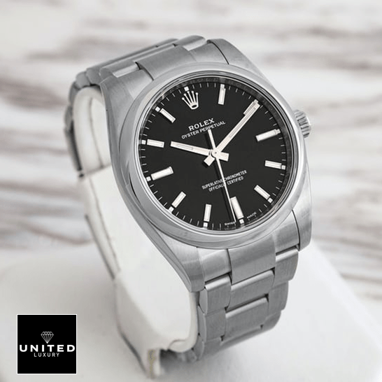 Rolex Oyster Perpetual Black Dial Replica ceramic background